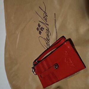 New Wristlet with zippered slot.